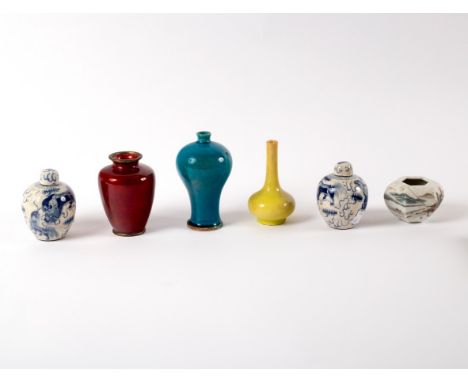 A Japanese red enamel vase decorated a carp, 8.5cm high, a pair of miniature Chinese ginger jars and covers, six character ma