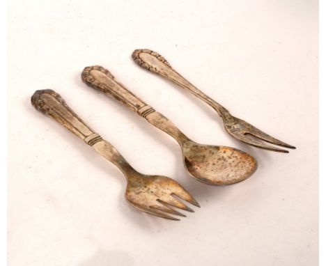 A Georg Jensen lily of the valley pattern serving spoon and fork and a fork with two tines, import marks London 1936/38, appr