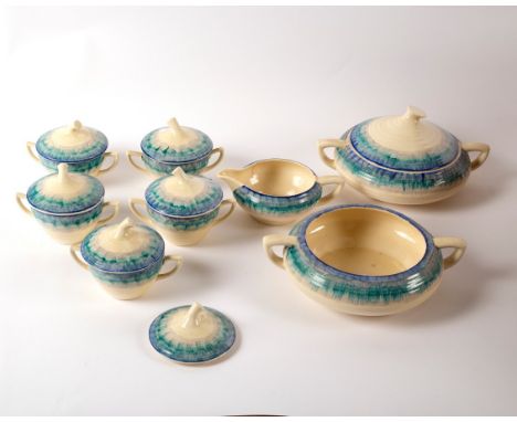A Clarice Cliff part dinner service in the Bizarre Aura pattern, Wilkinson and Son, comprising two tureens and one cover, six