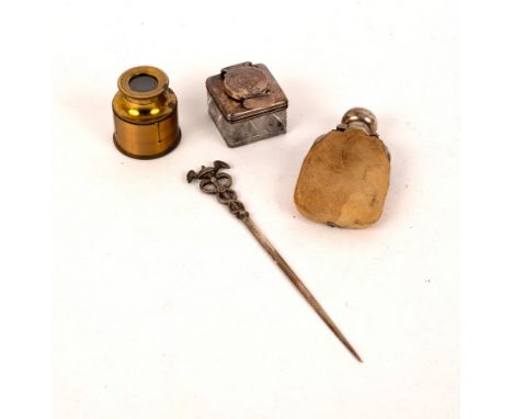 A Victorian silver letter knife, London 1849, with caduceus handle, a small silver hip flask, Sheffield 1923, a silver travel