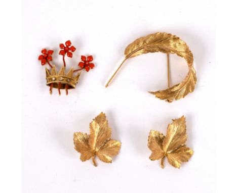 A diamond and enamel brooch modelled as three red roses issuing from an antique crown with diamonds to the brow, two 9ct gold