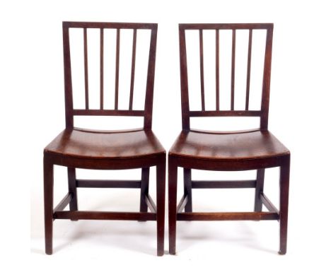 A pair of 19th Century fruitwood stick back chairs with solid seats on square taper legs CONDITION REPORT: Both chairs are st