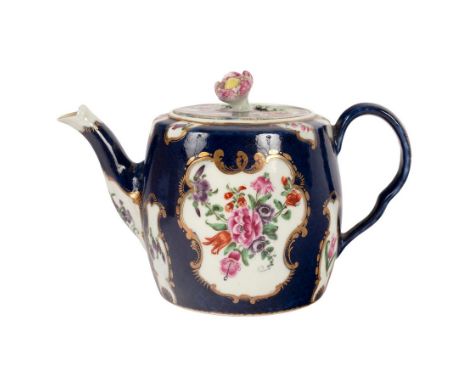 A Worcester blue scale ground barrel-shaped teapot, circa 1770, painted flowers in gilt frame cartouches, 12cm high/Provenanc