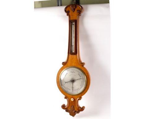 A Regency oak wheel barometer with thermometer by Negretti &amp; Zambra 103cm high