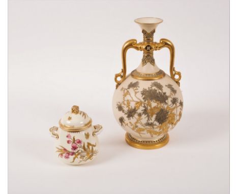 A Derby Crown two-handled jar and cover in the aesthetic taste, painted and tri-colour gilt with flower spray and butterflies