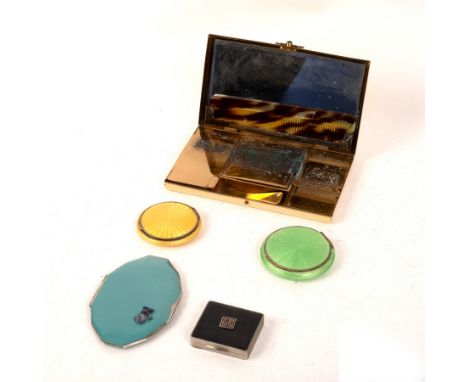 A silver and enamel compact, import marks HCF Ltd., London 1932, the black enamel cover with applied initials GJD, 4.5cm x 4c