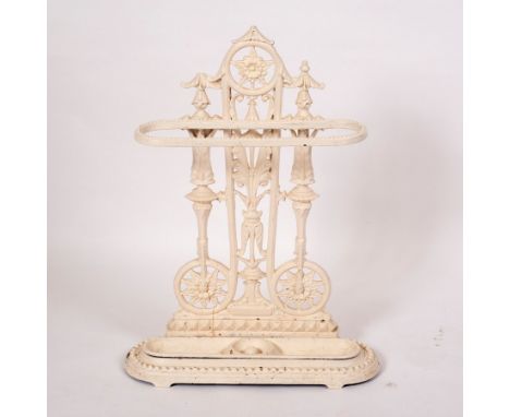 A cast iron umbrella stand, 76cm high CONDITION REPORT: One finial missing from the top, the back has been re-strengthened an