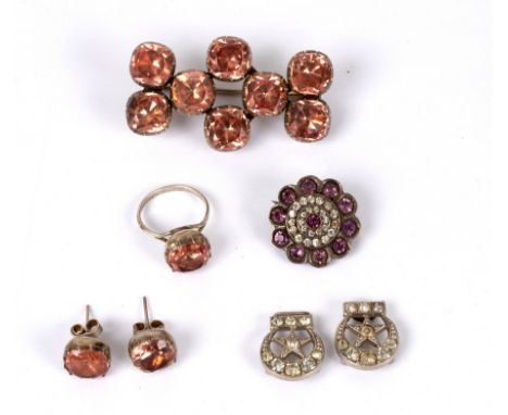 A pink paste suite of jewellery comprising ring, size K, pair ear studs, and brooch and another paste brooch and buckle