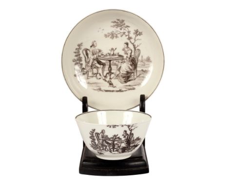 A Worcester teabowl and saucer, circa 1770, printed in black with 'The Tea Party'/Provenance: From the collection of Sir Roy 