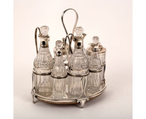 A George III silver cruet stand, possibly Robert, David & Samuel Hennell, London circa 1802, with reeded loop handle and on a