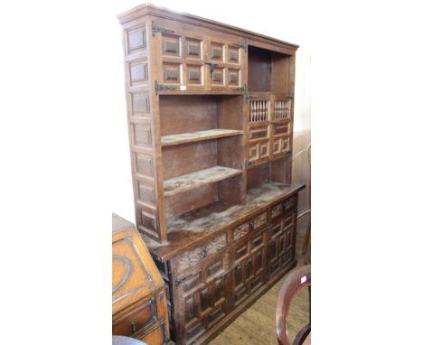 A modern hardwood cupboard dresser with three drawers and part shelf to top