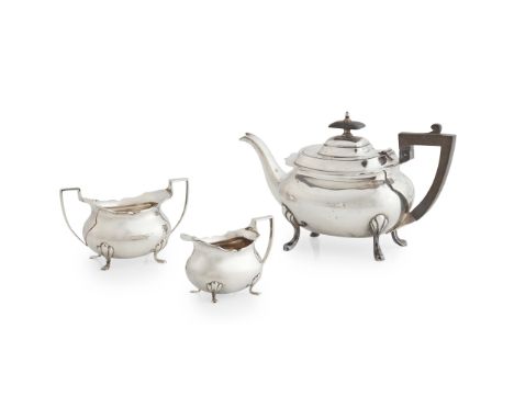 An early 20th-Century three-piece tea service C T Burrows &amp; Sons, Birmingham 1912, of rounded baluster form, comprising a
