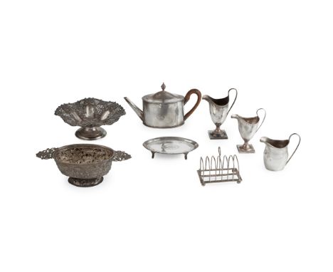 A George III teapot and matched teapot stand Benjamin Mountigue, London 1784, of oval shape with beaded borders, engraved ini