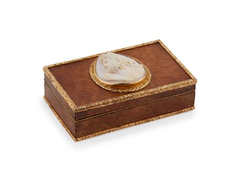 An early 19th-Century French yew wood snuff box the yew box of rectangular form with yellow metal foliate borders, interior a