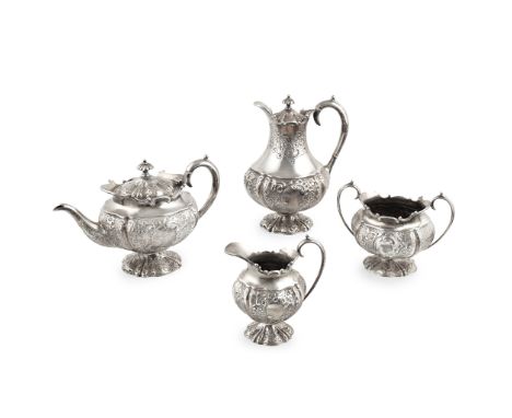 Y A late Victorian four-piece tea set John Alexander Fettes, Glasgow 1901, comprising a waterpot, teapot, twin-handled sugar 