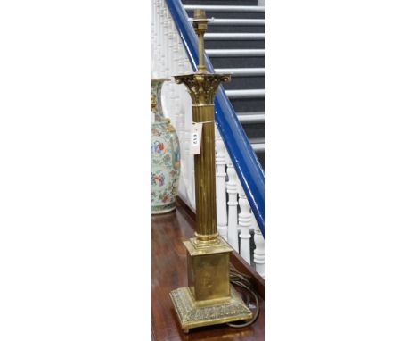 A brass Corinthian column lamp base, 74cm overall