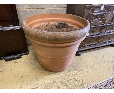 A large Italian circular terracotta garden planter, diameter 76cm, height 64cm