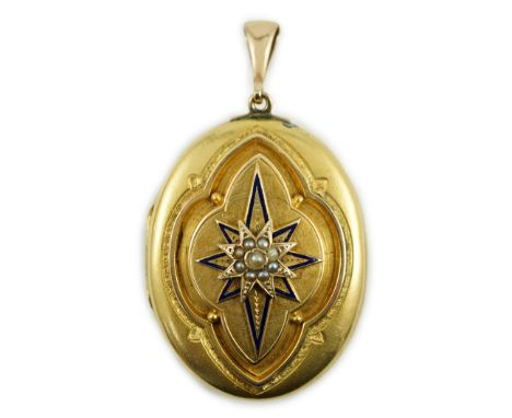 A Victorian yellow metal, blue enamel and seed pearl set oval locket, 40mm, gross weight 13.8 grams.