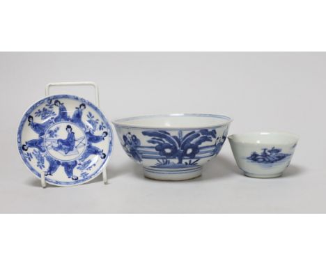 A Chinese Kangxi blue and white tea bowl and saucer, and a blue and white bowl, largest 13cm diameter