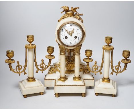 A 19th century alabaster clock garniture, 34cm