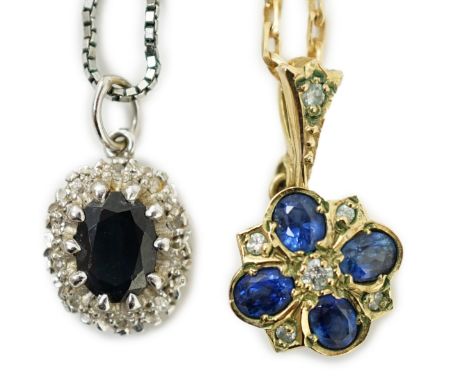 A modern 9ct gold, sapphire and diamond set pendant, overall 19mm, on a 375 chain, 38cm and a similar white metal, sapphire a