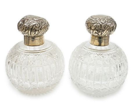 A pair of late Victorian silver mounted cut glass globular scent bottles (a.f.), Haseler Brothers, Birmingham, 1894/5, height