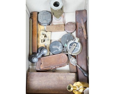 A group of surveying and scientific instruments, early 20th century, including and Elliot brothers London pocket sextant A in