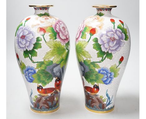 A pair of Chinese cloisonne enamel vases, 31cms high
