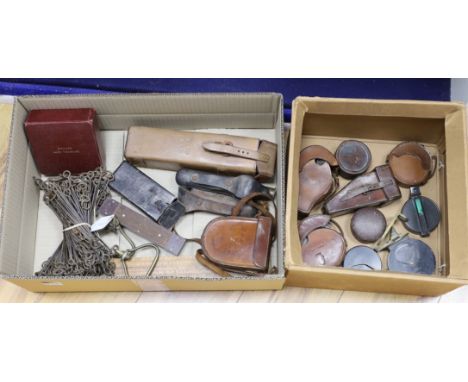 A group of surveying and scientific instruments, early 20th century, Including dual cased Watkins clinometer and compass, a c