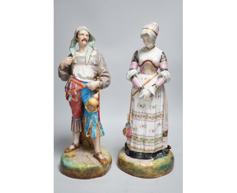 A pair of large Paris porcelain figures of a gentleman and a lady, lady 41cms high