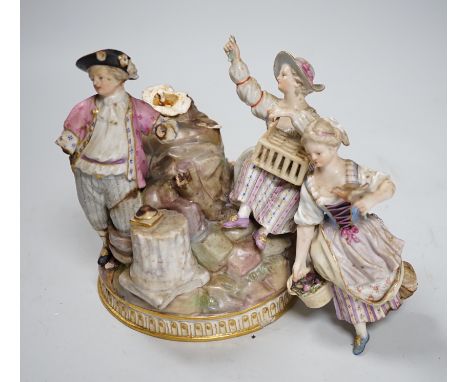 A Meissen group of flower pickers with bird cage, model F94 (a.f.)