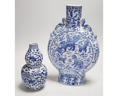 A Chinese blue and white moonflask and a similar double gourd vase, 19th century, moon flask 31cms high