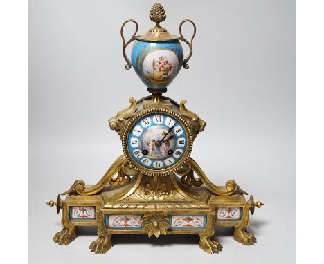 A Sevres style porcelain mounted ormolu mantel clock, 36cms high