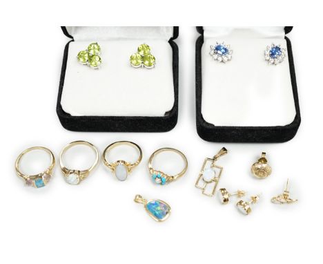 Four assorted modern 9ct gold and gem set rings including two white opal, gross weight 9.4 grams, two pairs of modern 9ct gol