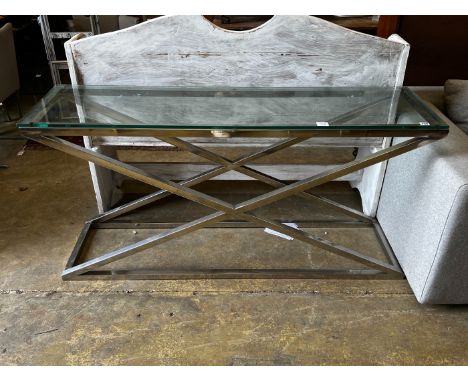 A contemporary rectangular glass top console table on X shaped frame, width 150cm, depth 40cm, height 74cm