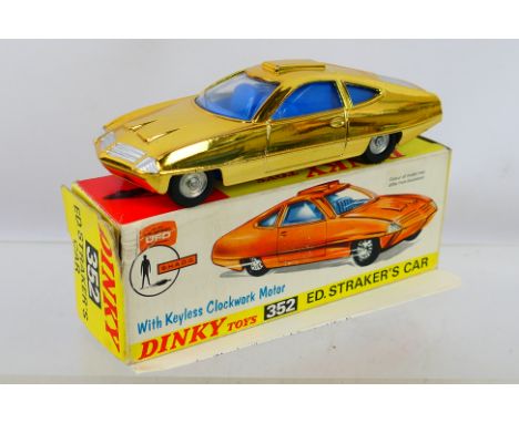 Dinky - A boxed #352 'UFO' Ed Straker's Car in Gold. Item appears in excellent condition and comes with its instruction sheet