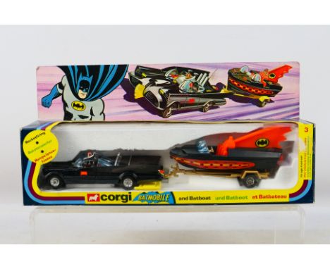 Corgi - A boxed #3 Batmobil with Batboat. Item appears mint in box with original missiles still attached to their sprue's Box