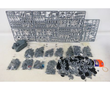 Warhammer - Games Workshop - An assembled and unpainted Warhammer Space Marines Rhino with 43 large Warhammer sprues and 10 b
