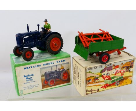 Britains - A pair of boxed Britains Farm diecast models to include #128F Fordson Major Tractor with rubber tyres (with figure