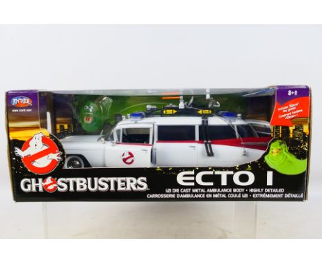 Joy Ride - A boxed 1/21 scale diecast Ghostbusters ECTO 1 (#33538). Item appears mint in a very good-excellent box. (This doe