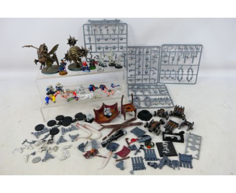 Warhammer - Citadel - Games Workshop - A group of metal and plastic Warhammer figures from various games with some loose part