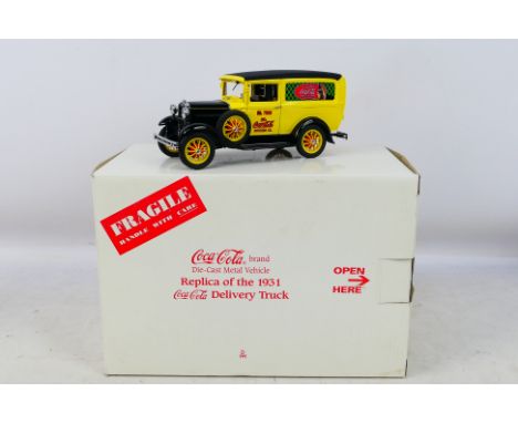 Danbury Mint -  A boxed 1/24 scale Replica of the 1931 Coca-Cola Delivery Truck. Item appears in excellent-near mint conditio