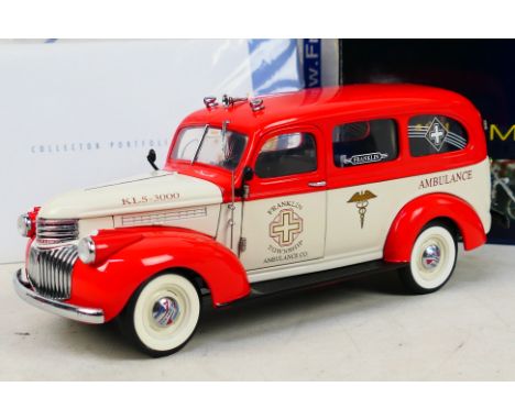 Franklin Mint - A boxed Limited edition 1/24 scale 1946 Chevy Suburban Ambulance with tag and ephemera. Item appears in excel