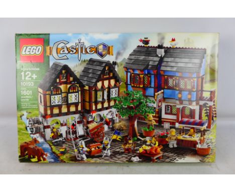Lego - A boxed 2009 Lego 'Fantasy Era' #10193 Medieval Market Village. The set has been resealed at some point with all seals