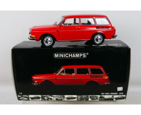Minichamps - A boxed 1/18 scale VW 1600 L Variant 1970. Item appears in near mint condition and is house in its original poly