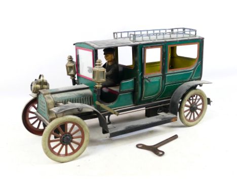 Carette - A large early 20th century clockwork tinplate Limousine by Carette circa 1910 based on a contemporary Mercedes. The