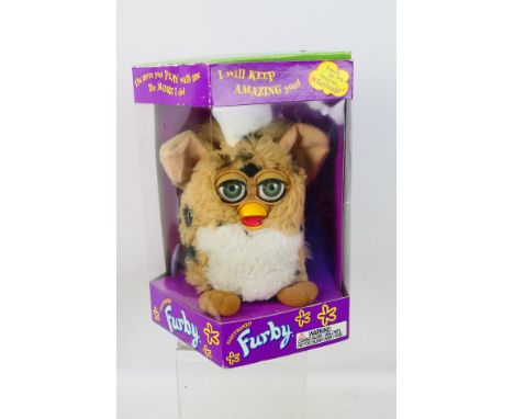 Hasbro - A boxed generation 4 (1999) Electronic Furby #70-800 Cheetah. Item appears in excellent condition but is loose in it