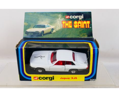 Corgi - A boxed #320 'The Saint' Jaguar XJS. Item appears to be in excellent-near mint condition. Housed in a good-very good 