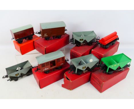 Hornby - A group of boxed O gauge wagons, track sections and accessories including Cattle Truck # 42105, Goods Van # 42160, H