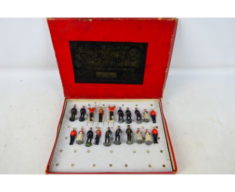 Britains - Set 137 - An early 20th century Royal Army Medical Service set with Nursing Sisters & Wounded # 137. There is one 